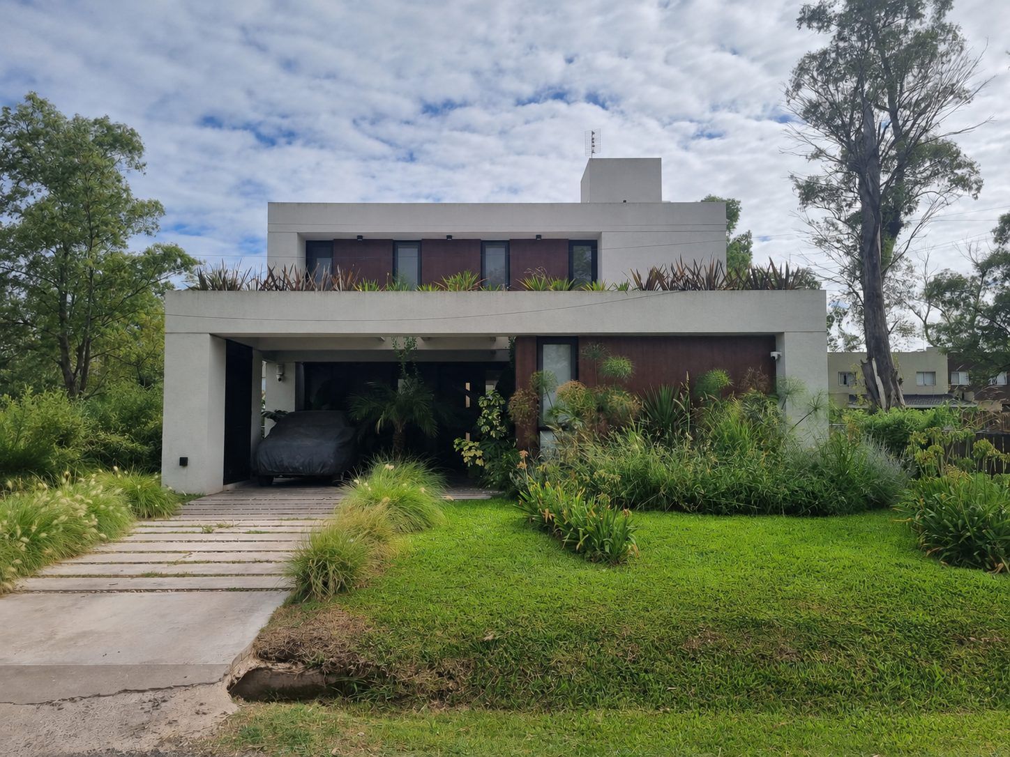 Casa ADB, vivienda unifamiliar sustentable en Francisco Álvarez, Buenos Aires — foto 12 de 12. Proyecto del Arq. Germán Vázquez