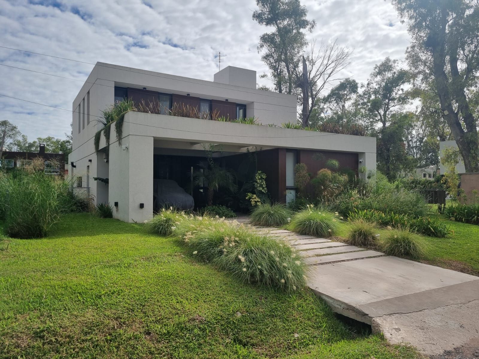 Casa ADB, vivienda unifamiliar sustentable en Francisco Álvarez, Buenos Aires — foto 6 de 12. Proyecto del Arq. Germán Vázquez